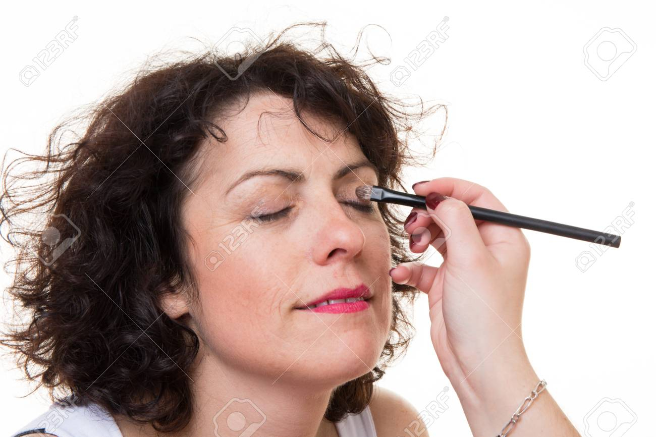 White Makeup In Corner Of Eye Make Up Artist Applying White Eyeshadow In The Corner Of Models