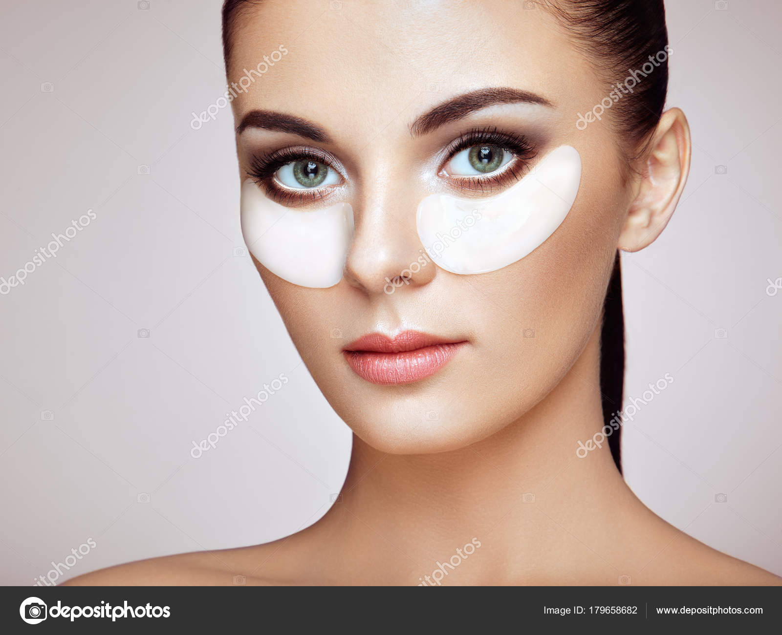White Makeup Under Eyes Portrait Of Beauty Woman With Eye Patches Stock Photo